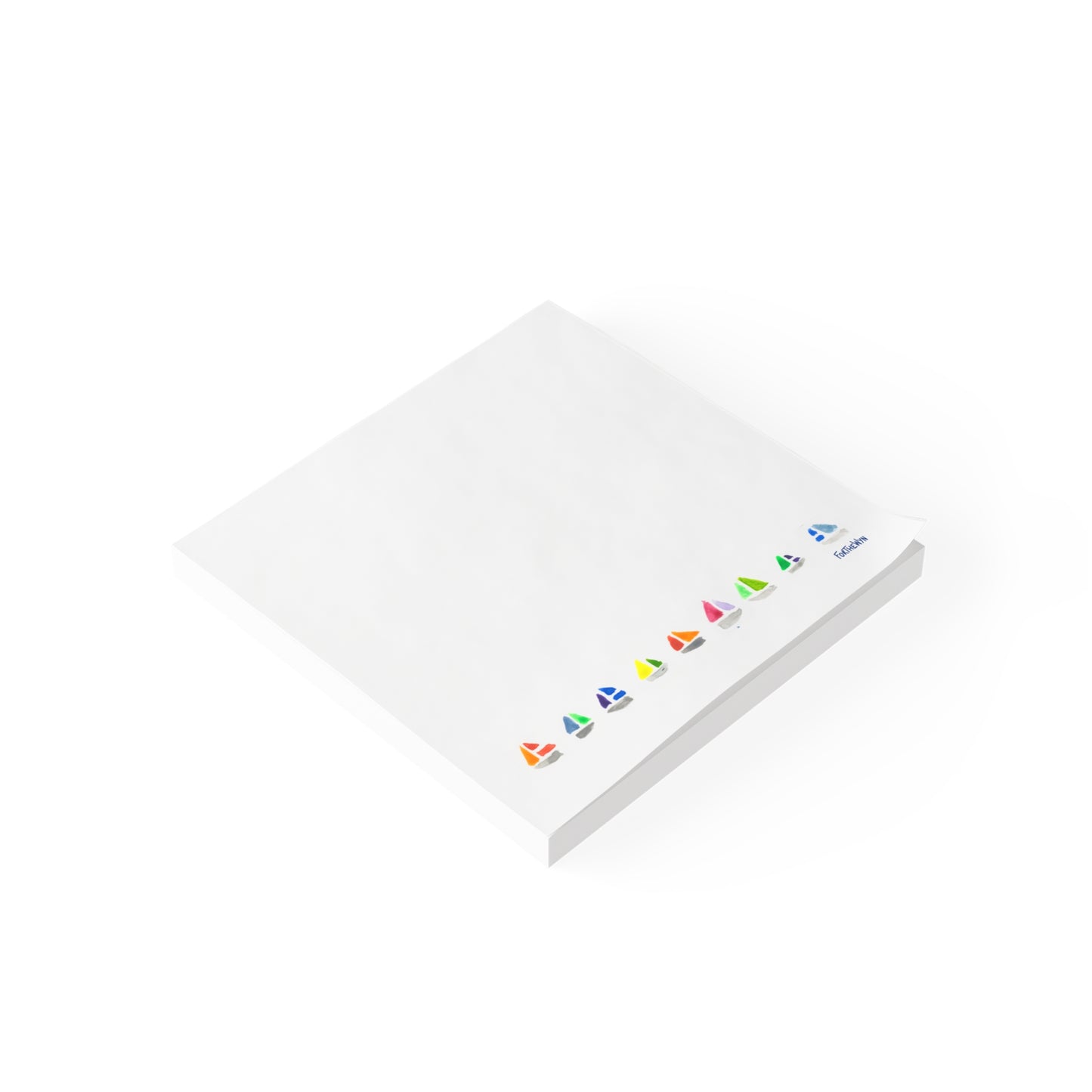 white notepad with sailboats colorful