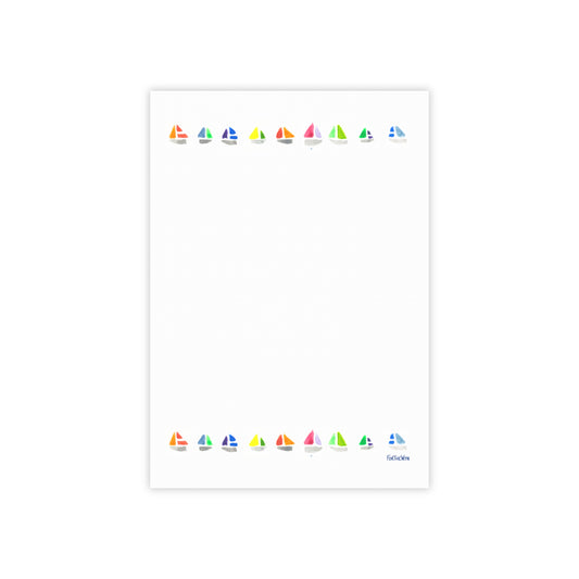 Colorful sailboat illustrations on a white background